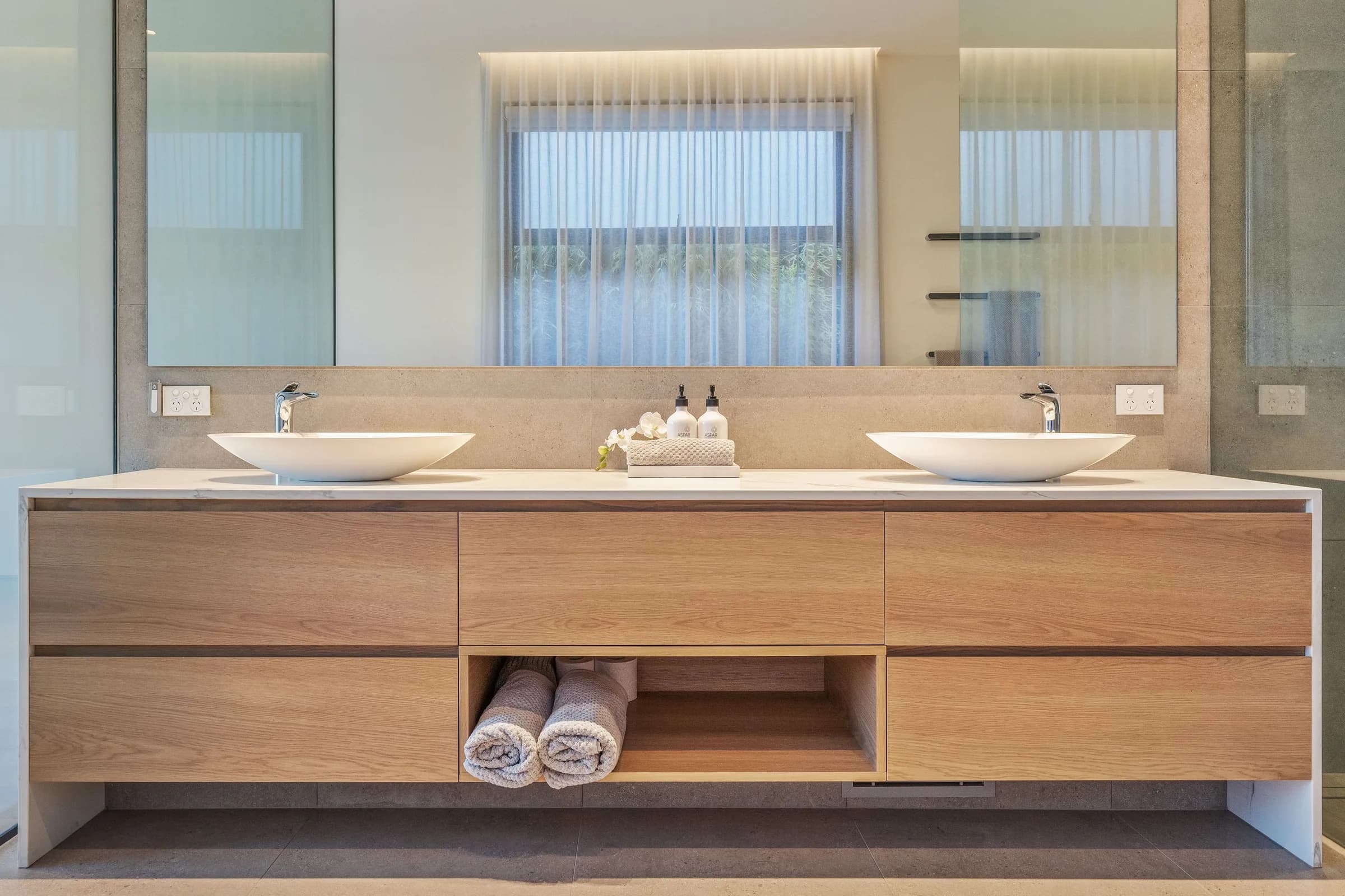 Oak vanity bathroom with double basins and full-width mirror